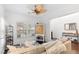 Bright and airy living room with hardwood floors, stylish decor, and natural lighting at 5022 W Liberty Meadows Dr, Summerville, SC 29485
