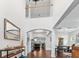 Spacious living area featuring hardwood flooring, high ceilings, and an open floor plan at 5022 W Liberty Meadows Dr, Summerville, SC 29485