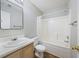 Bathroom with a single sink vanity, standard fixtures, and a shower-tub with curtain at 527 Hainsworth Dr, Charleston, SC 29414