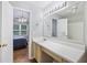 Bathroom featuring an extended vanity with a view into an adjacent bedroom at 527 Hainsworth Dr, Charleston, SC 29414