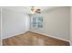 Bedroom with light walls, modern ceiling fan, and a window with natural light at 527 Hainsworth Dr, Charleston, SC 29414