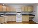 The kitchen has lots of cabinets, countertops, and modern appliances at 527 Hainsworth Dr, Charleston, SC 29414