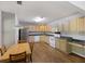 The kitchen features modern appliances and plenty of cabinets at 527 Hainsworth Dr, Charleston, SC 29414