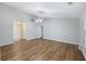 Open-concept living space with hardwood floors and neutral paint at 527 Hainsworth Dr, Charleston, SC 29414