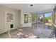 Screened-in patio with a table and view of the backyard at 527 Hainsworth Dr, Charleston, SC 29414