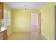 Inviting dining area with natural light and modern light fixture at 5321 Trudy St, North Charleston, SC 29418