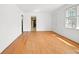 Living room with hardwood floors, natural light and neutral walls that offer a blank canvas for your design ideas at 5321 Trudy St, North Charleston, SC 29418