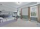 ' bedroom with gray bunk beds, large windows, and neutral decor at 539 Cooper Village Ln, Mount Pleasant, SC 29464