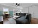 Spacious living room with large sectional couch and deck access with a view at 539 Cooper Village Ln, Mount Pleasant, SC 29464