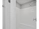 Modern shower with white subway tile, a built-in bench, and sleek hardware at 539 Cooper Village Ln, Mount Pleasant, SC 29464