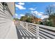 Balcony featuring a white railing and a view of the neighborhood at 55 Maple St, Charleston, SC 29403
