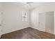 Bright bedroom features hardwood floors, ceiling fan and natural light at 55 Maple St, Charleston, SC 29403