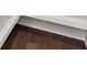 Close-up view of elegant hardwood flooring with bright white trim at 55 Maple St, Charleston, SC 29403
