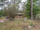 Charming brick home featuring a covered front porch, perfect for enjoying the outdoors at 604 King St, Walterboro, SC 29488