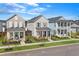 Charming two-story home with a well-manicured lawn and inviting front porch at 619 Trio Ln, Summerville, SC 29486