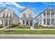 Charming two-story home with a well-manicured lawn at 619 Trio Ln, Summerville, SC 29486