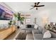 Comfortable living room with a plush sectional sofa, modern decor, and natural lighting at 619 Trio Ln, Summerville, SC 29486