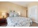 Bedroom with decorative pillows and two side tables with lamps for soft lighting at 67 Lost Village Trl # 4, Edisto Island, SC 29438
