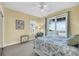 Inviting bedroom with access to a private balcony boasting scenic views and a sitting chair at 67 Lost Village Trl # 4, Edisto Island, SC 29438