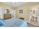 Bedroom with a ceiling fan and an adjoining bathroom with a pedestal sink at 67 Lost Village Trl # 4, Edisto Island, SC 29438