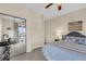 Relaxing bedroom with balcony access, desk, and a serene decor at 67 Lost Village Trl # 4, Edisto Island, SC 29438