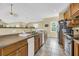 Spacious kitchen featuring stainless steel appliances, custom cabinetry, and tile flooring at 67 Lost Village Trl # 4, Edisto Island, SC 29438