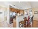 Bright eat-in kitchen featuring stainless steel appliances, custom cabinetry and bar seating at 67 Lost Village Trl # 4, Edisto Island, SC 29438