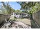 Well-maintained backyard with a mix of greenery, patio spaces, and fencing, offering privacy and relaxation at 710 W Harrison Rd, Charleston, SC 29407