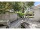 Spacious backyard with patio, outdoor seating, and barbecue, perfect for entertaining and relaxing at 710 W Harrison Rd, Charleston, SC 29407