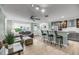 Open-concept living area featuring bar seating and modern kitchen at 710 W Harrison Rd, Charleston, SC 29407
