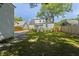 Spacious backyard featuring a lush lawn and partial shade, perfect for outdoor activities at 81 Avondale Ave, Charleston, SC 29407