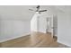 Bright bedroom with hardwood floors, a ceiling fan and an ensuite bathroom at 81 Avondale Ave, Charleston, SC 29407