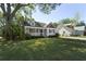 Charming single-Gathering home with well-manicured lawn, inviting front porch, and classic architectural details at 81 Avondale Ave, Charleston, SC 29407