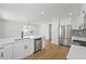 Modern kitchen featuring a marble island, stainless steel appliances, sleek cabinetry, and ample counter space at 81 Avondale Ave, Charleston, SC 29407