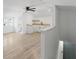 Bright living room with an adjoining kitchenette and vinyl floors at 81 Avondale Ave, Charleston, SC 29407
