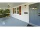 Charming covered porch featuring painted floors, updated lighting, and charming accents at 81 Avondale Ave, Charleston, SC 29407
