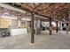 Unfinished basement with exposed ceiling, a concrete floor, and utilities at 8487 Parkers Ferry Rd, Adams Run, SC 29426