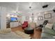 Cozy living room with whitewashed wood paneling, hardwood floors, and comfortable seating at 8487 Parkers Ferry Rd, Adams Run, SC 29426
