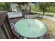 Above ground pool with deck and ladder, overlooking a grassy yard at 8487 Parkers Ferry Rd, Adams Run, SC 29426