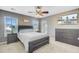 Comfortable bedroom featuring a ceiling fan, dresser, and TV, creating a cozy and functional space at 86 Cross Timbers Dr, Summerville, SC 29485