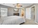 Serene bedroom with TV, closet, and an ensuite bathroom, perfect for relaxing after a long day at 86 Cross Timbers Dr, Summerville, SC 29485
