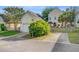 Charming home exterior with attached garage, mature landscaping, and inviting curb appeal at 86 Cross Timbers Dr, Summerville, SC 29485