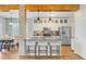 Modern kitchen featuring an island with seating, stainless steel appliances, and hardwood floors at 86 Cross Timbers Dr, Summerville, SC 29485