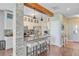 Modern kitchen with island, stainless appliances, and hardwood floors creating a sleek design at 86 Cross Timbers Dr, Summerville, SC 29485
