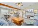 Spacious living room with open layout, wooden beams, and kitchen access at 86 Cross Timbers Dr, Summerville, SC 29485