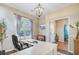 Bright office features a large desk and a large window with a view of the property across the street at 86 Cross Timbers Dr, Summerville, SC 29485