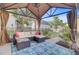 Comfortable outdoor seating area featuring a tent-like covering to provide shade and relaxation at 86 Cross Timbers Dr, Summerville, SC 29485