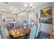 Dining room showcasing marble counters, pendant lights, and open concept design at 912 Cheehaw St, Edisto Island, SC 29438