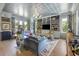 Cozy living room featuring custom built-ins, modern decor, and plenty of natural light at 912 Cheehaw St, Edisto Island, SC 29438