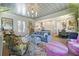 Bright living room featuring hardwood floors, an open layout, and designer furnishings at 912 Cheehaw St, Edisto Island, SC 29438